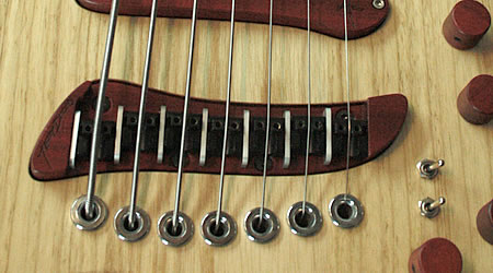 oracle-bronze-bass-guitar-bridge