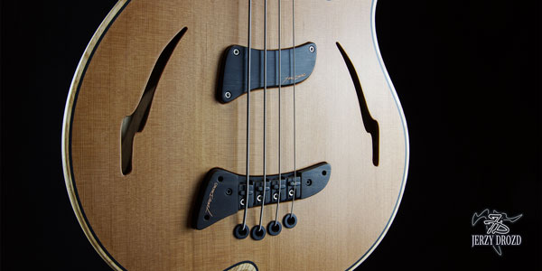 Front view of Barcelona Carles Benavent Piccolo pickup f holes and bridge